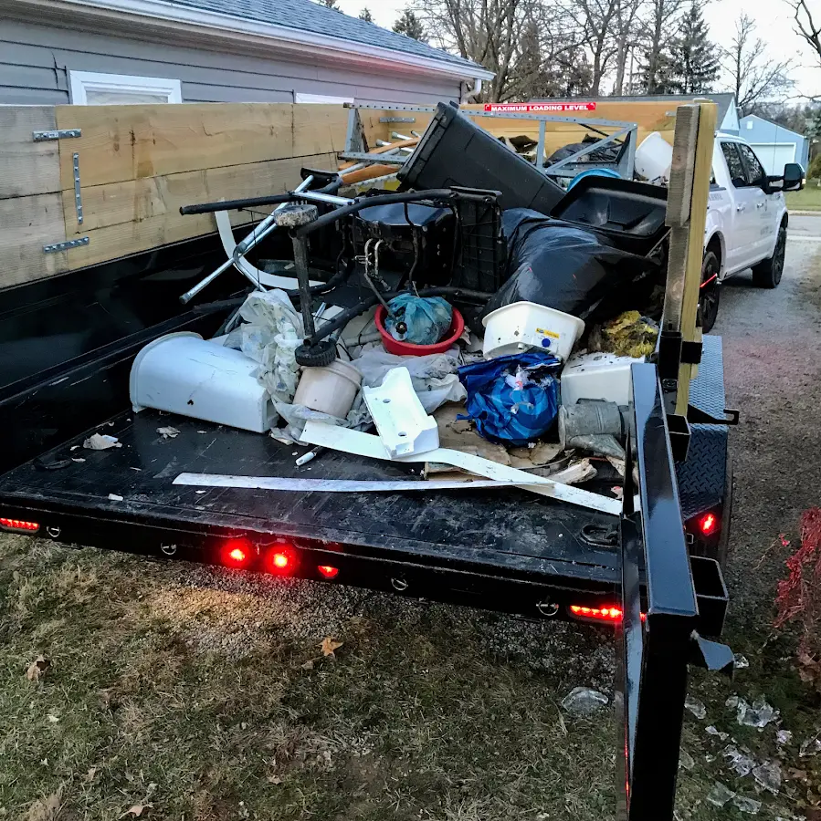 Roll-off dumpster delivered to a residential driveway in Whitfield